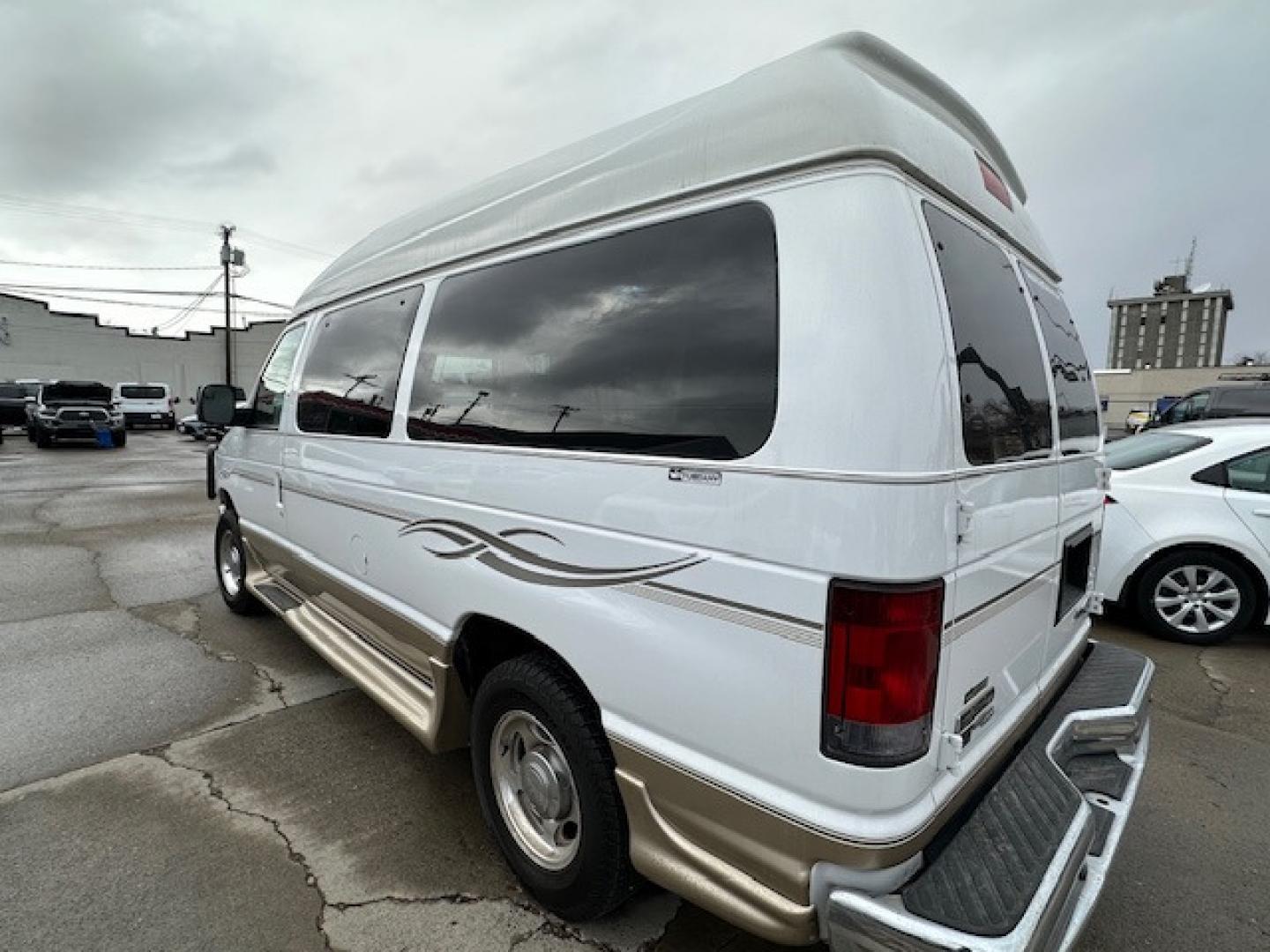 2017 White Ford E Series Van Tuscany Conversion with an 5.4 V8 engine, Automatic transmission, located at 3200 1st Avenue North, Billings, MT, 59101, (406) 245-9055, 45.779270, -108.510742 - Low Mileage, Handicap Accessible Custom Hi-Roof Van. Passenger Side Power Lift with Cargo Doors, 5.4 V8, Running Boards, Designed By Mobility Of Denver and Only 81,000 Miles. CarFax Dealer. Auto Brokers of Montana/AA&A Auto Rental/Fox Car Rental Billings - Photo#9